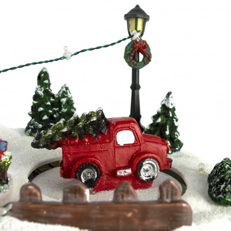 Giostrina e scenario natalizio 361002 con negozio luci musica e movimento natale