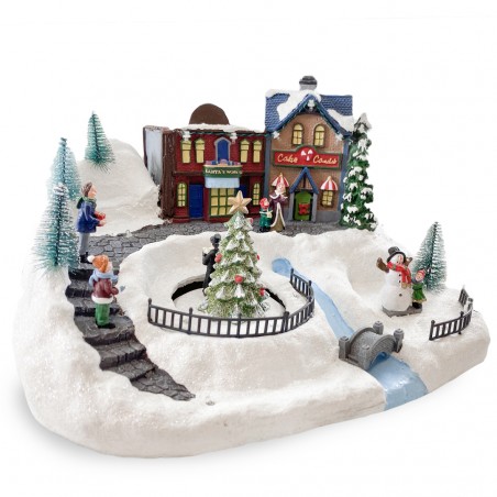 Villaggio Natalizio Innevato 361038 Giostra con Luci Suoni Movimento 37x21x27 cm