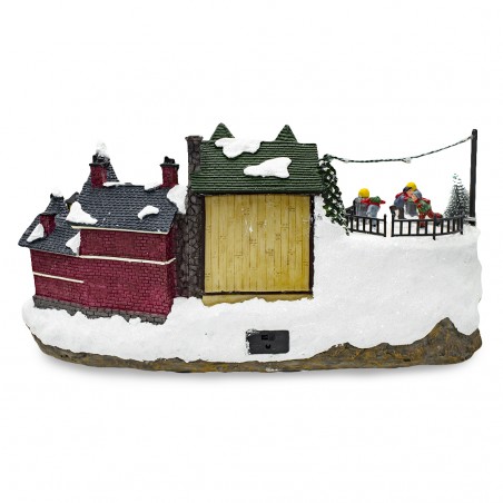 Villaggio Natalizio Innevato 361015 Giostra Luci Suoni e Movimento 37x16x18 CM