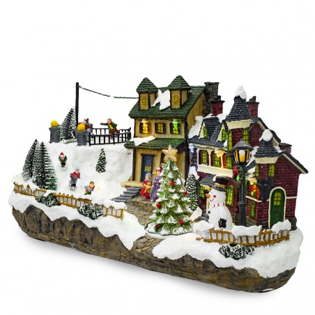 Villaggio Natalizio Innevato 361015 Giostra Luci Suoni e Movimento 37x16x18 CM