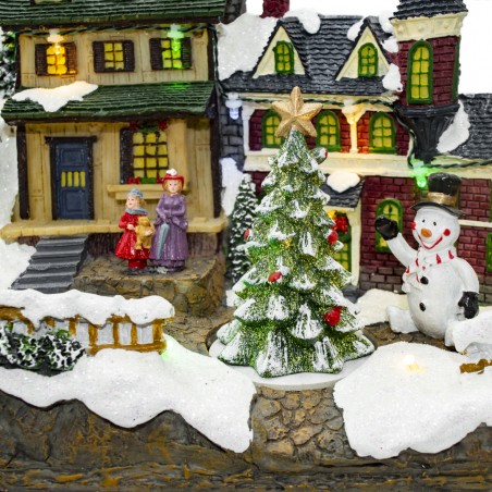 Villaggio Natalizio Innevato 361015 Giostra Luci Suoni e Movimento 37x16x18 CM