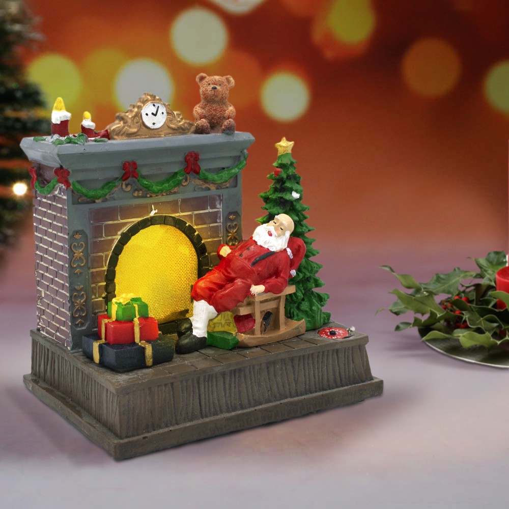 Scenario giostra natalizia camino e Babbo...