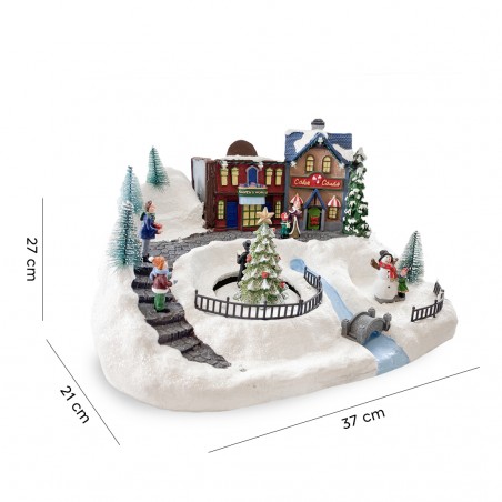 Villaggio Natalizio Innevato 361038 Giostra con Luci Suoni Movimento 37x21x27 cm