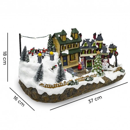 Villaggio Natalizio Innevato 361015 Giostra Luci Suoni e Movimento 37x16x18 CM