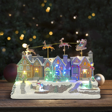 Villaggio Natalizio Slitta 367011 Addobbo con Luci Suoni e Movimento 40x18x28cm